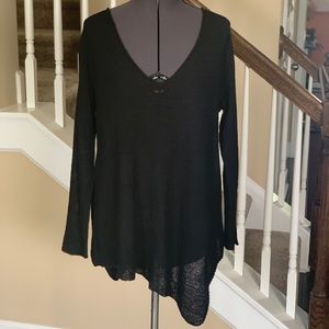 A-symmetrical hem sweater